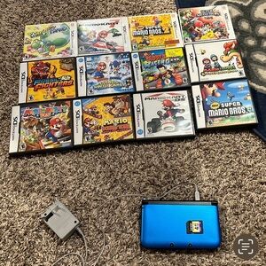 Nintendo 3DS XL Handheld System - Blue/Black Plus 12 Games And Accessories